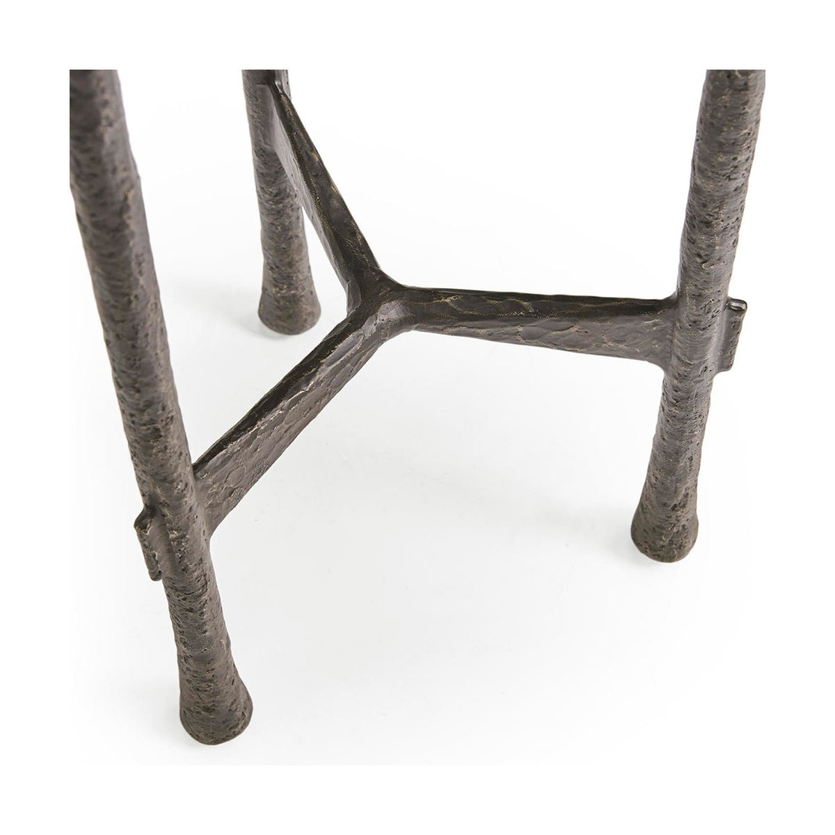 Close-up of leg design and structure under table.