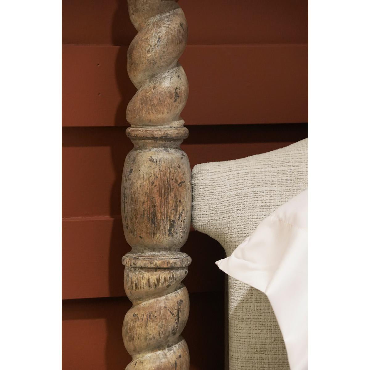 Rustic post detail against background on farmhouse bed.